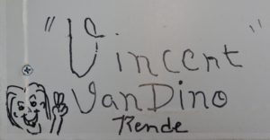 Dino's name with a cartoon