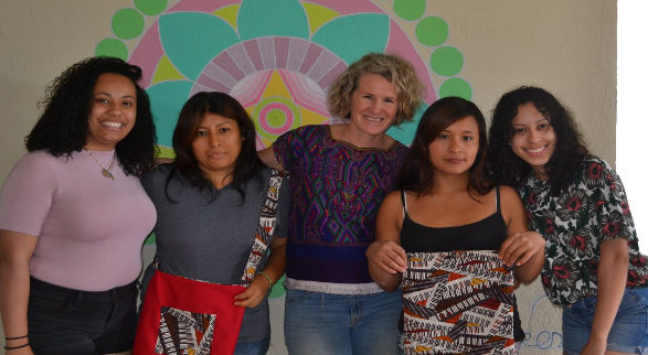 Angela Kunz poses with several Guatemalans
