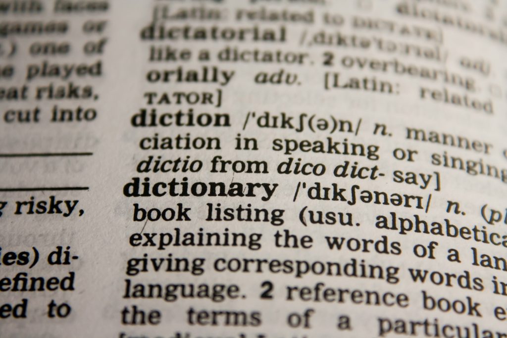 A close up of a page from a dictionary