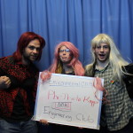 Students holding NoH8 Fall 2014 whiteboard