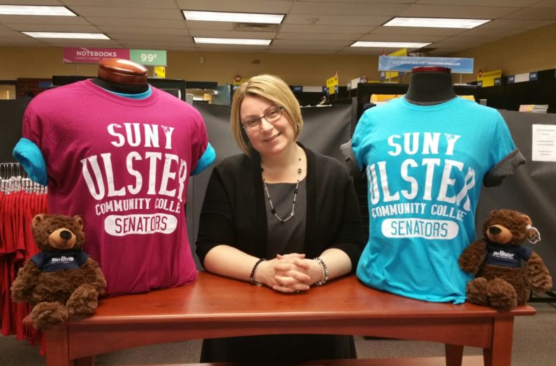 Lucia Pecore with SUNY Ulster merchandise
