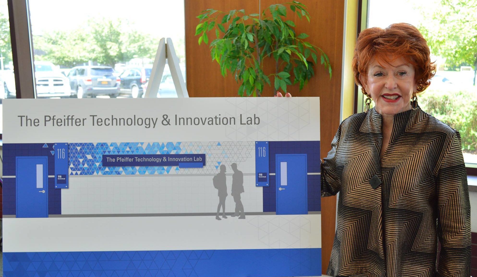 Pfeiffer lab sign with Darlene Pfeiffer