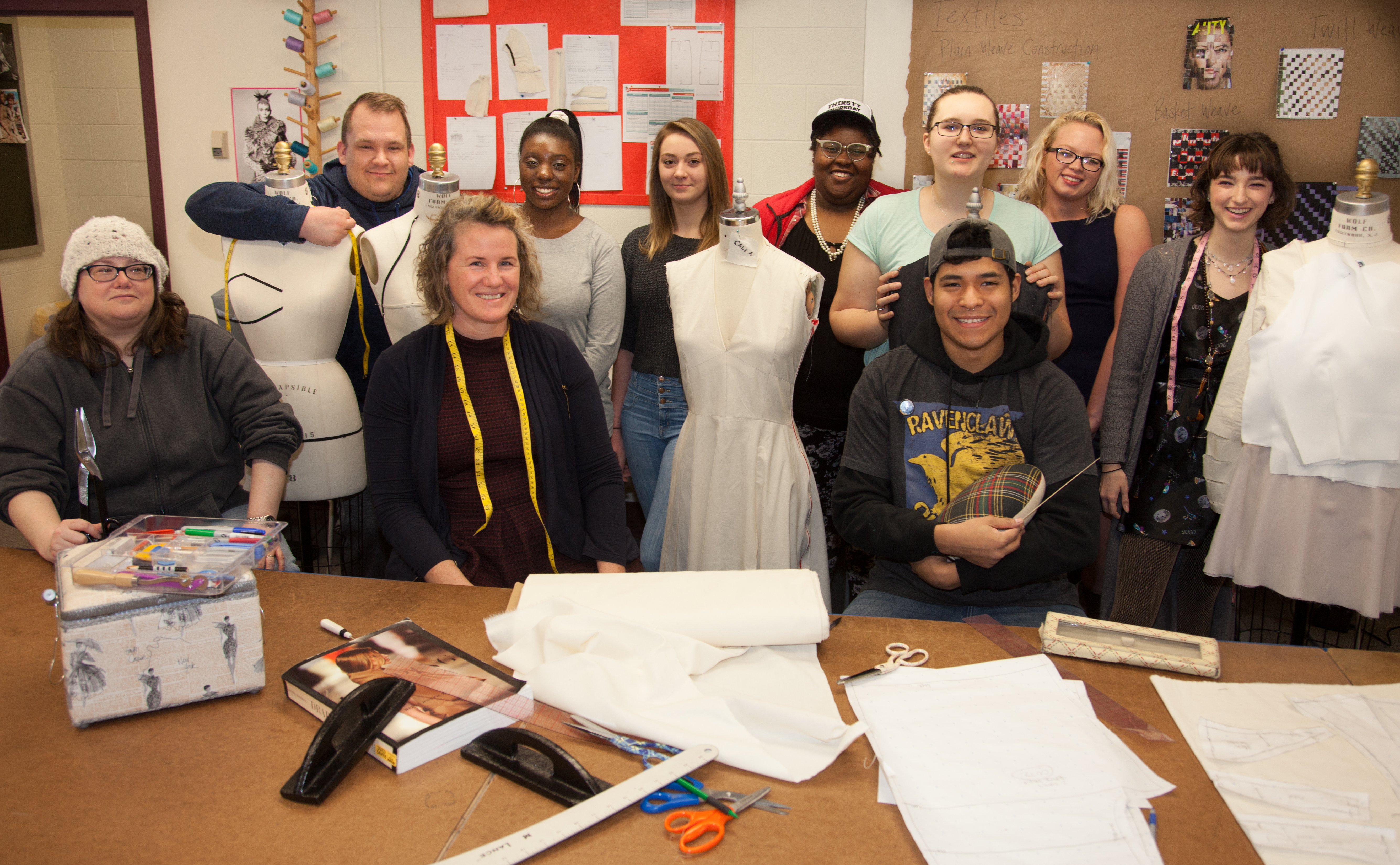 Angela Kunz surrounded by a fashion class