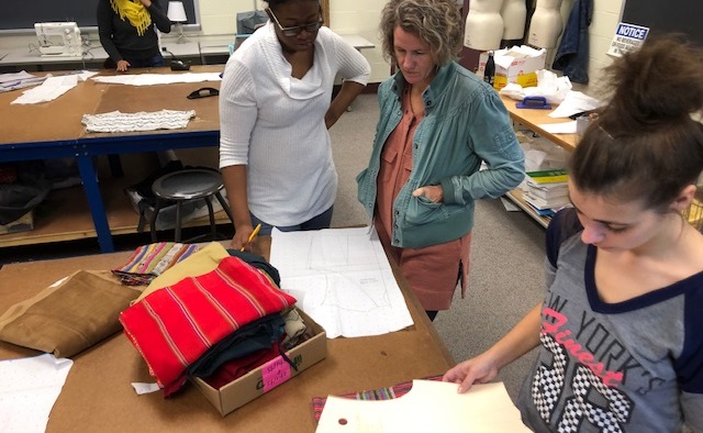 Fashion students working on their apparel designs