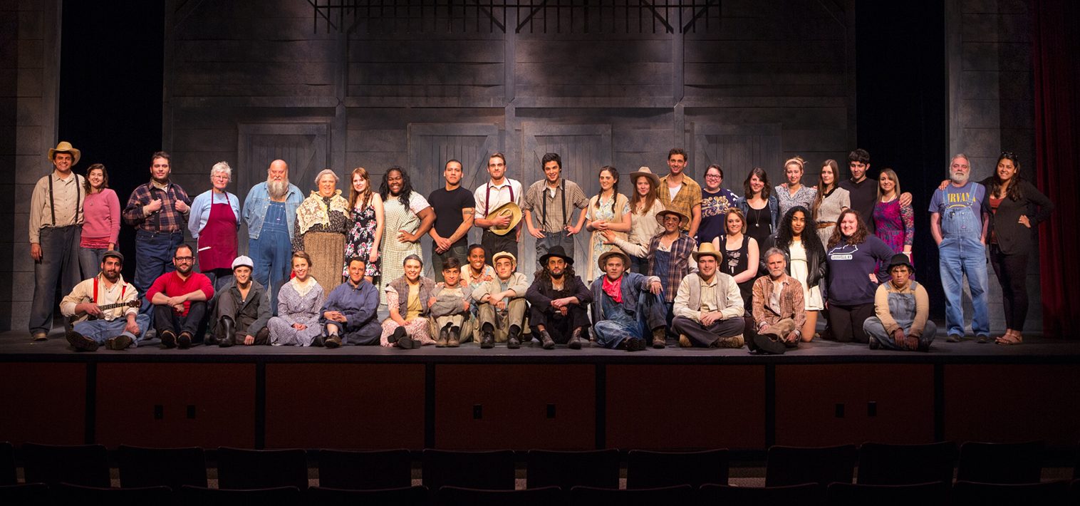 Theatre students on stage after a performance
