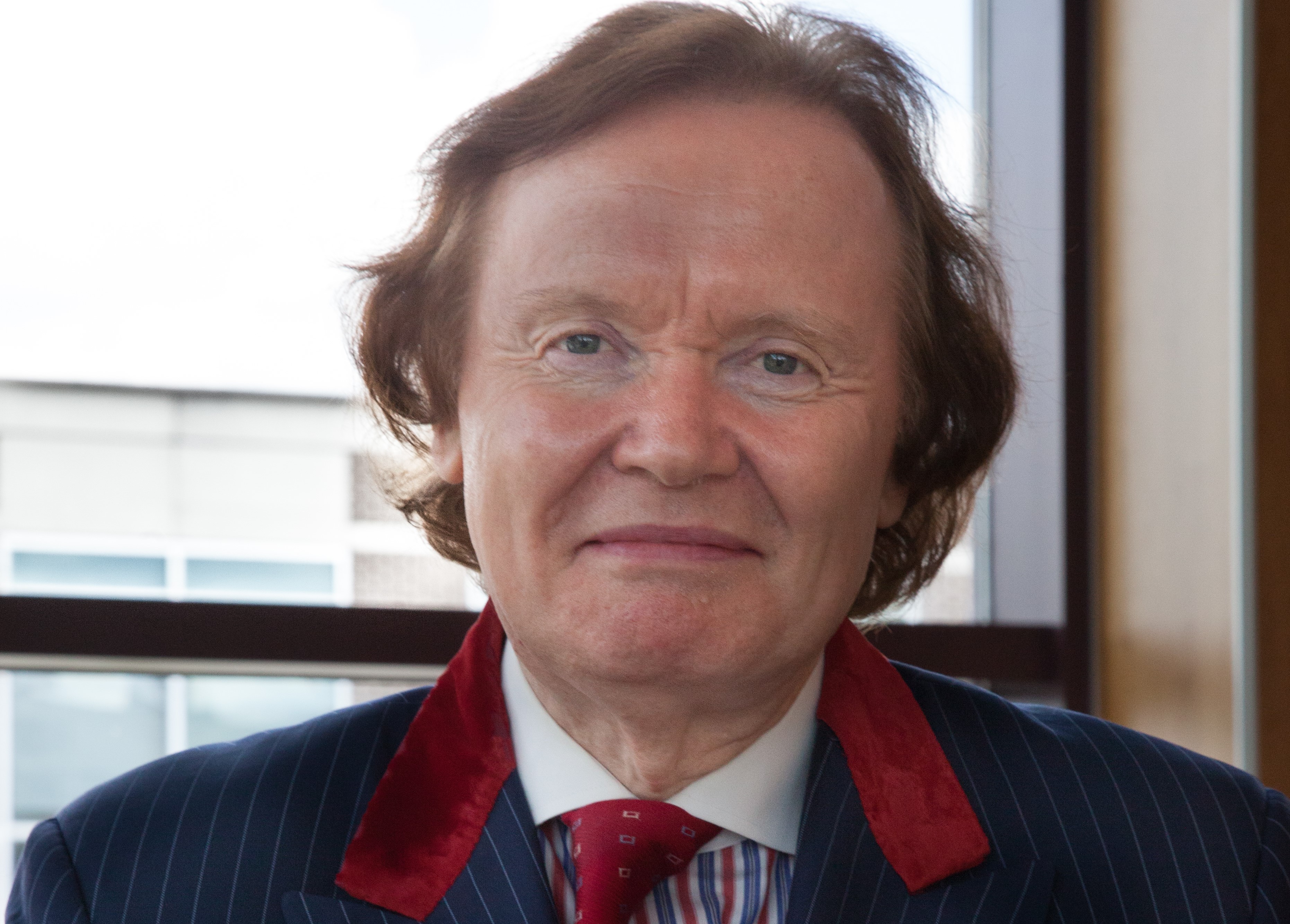 Portrait photograph of Raymond Ray