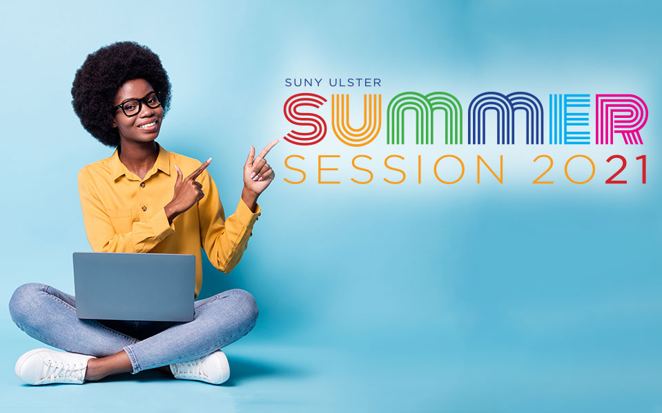 Student sitting cross legged with laptop on lap. Text overlay saying: Summer Session 2021