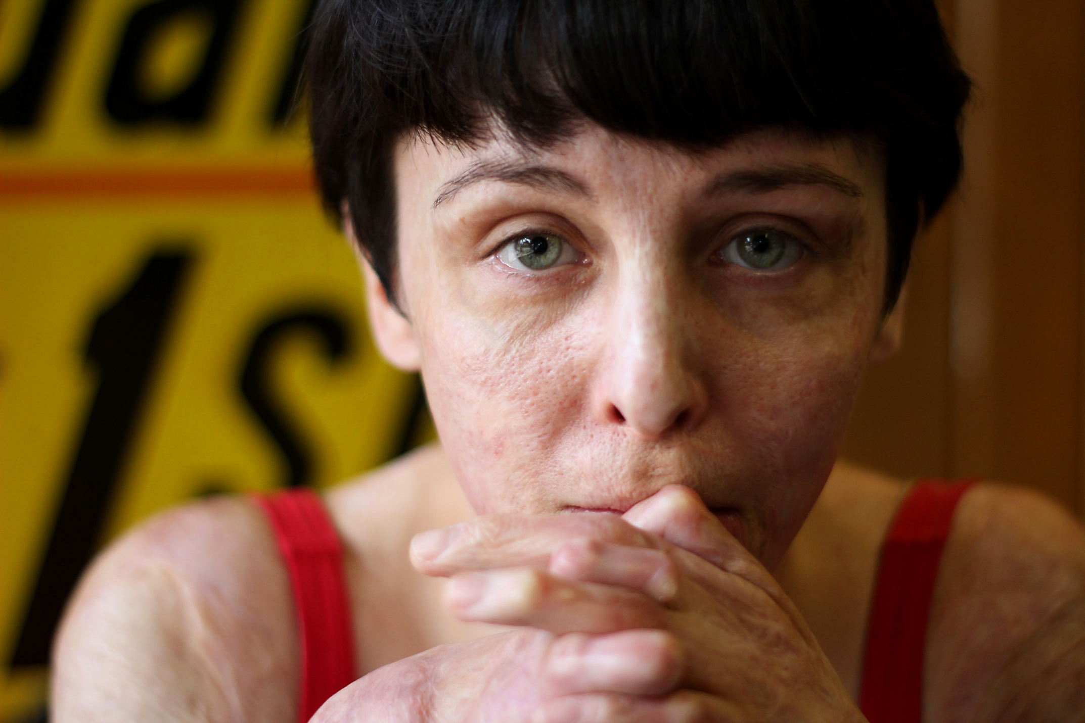 Dina peone looking at camera