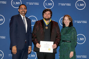 Mark LaBorde stands with President and Chancellor