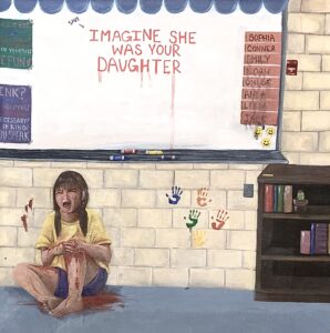 photograph of girl sitting against a wall