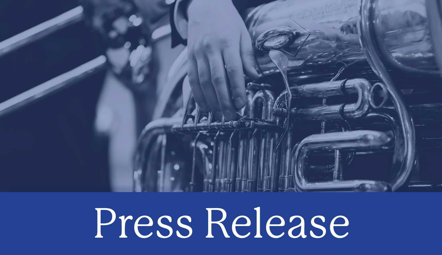 Press Release with tuba photo representing music