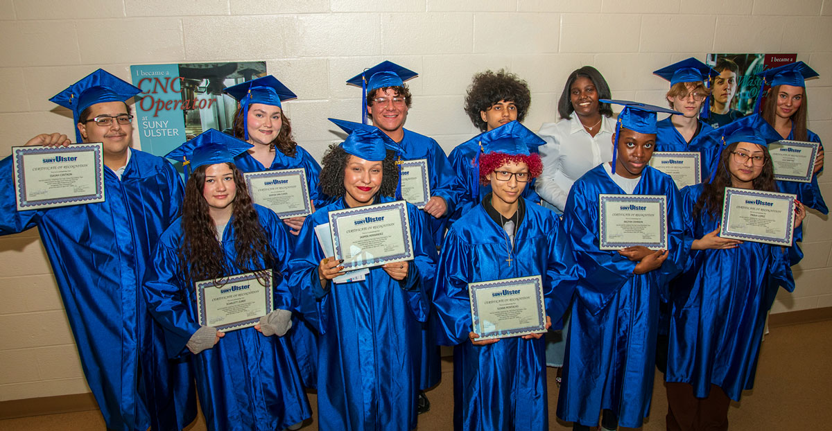 GED students with diplomas