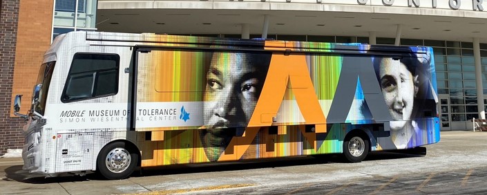 Bus with images of Dr Martin Luther King Jr and Anne Frank
